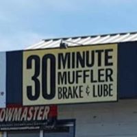 30 Minute Muffler logo